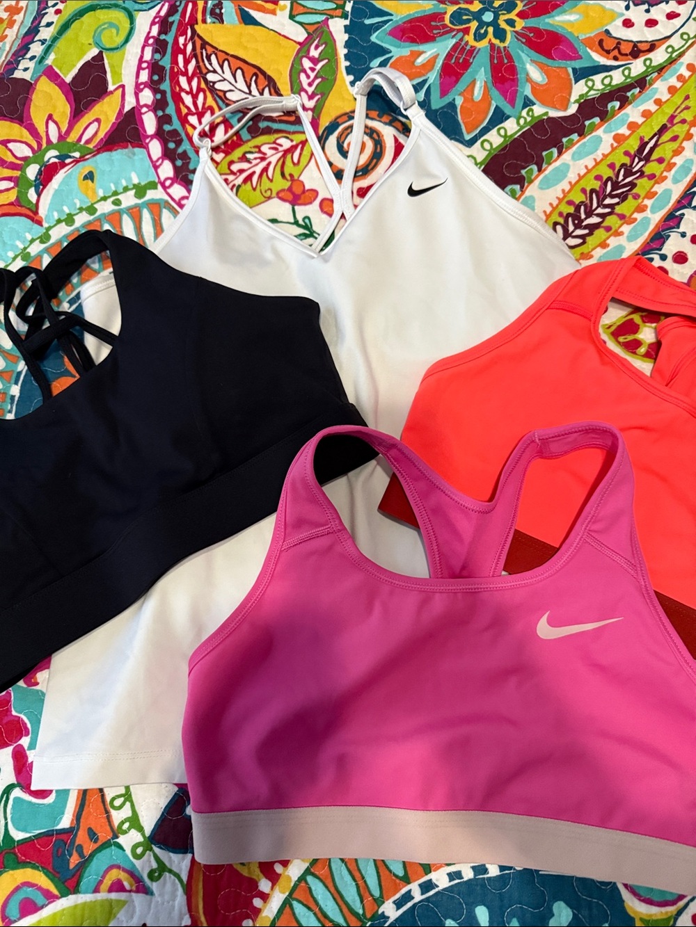 Nike Women’s Sports Bra Bundle, white Nike Tank Top and black bra.